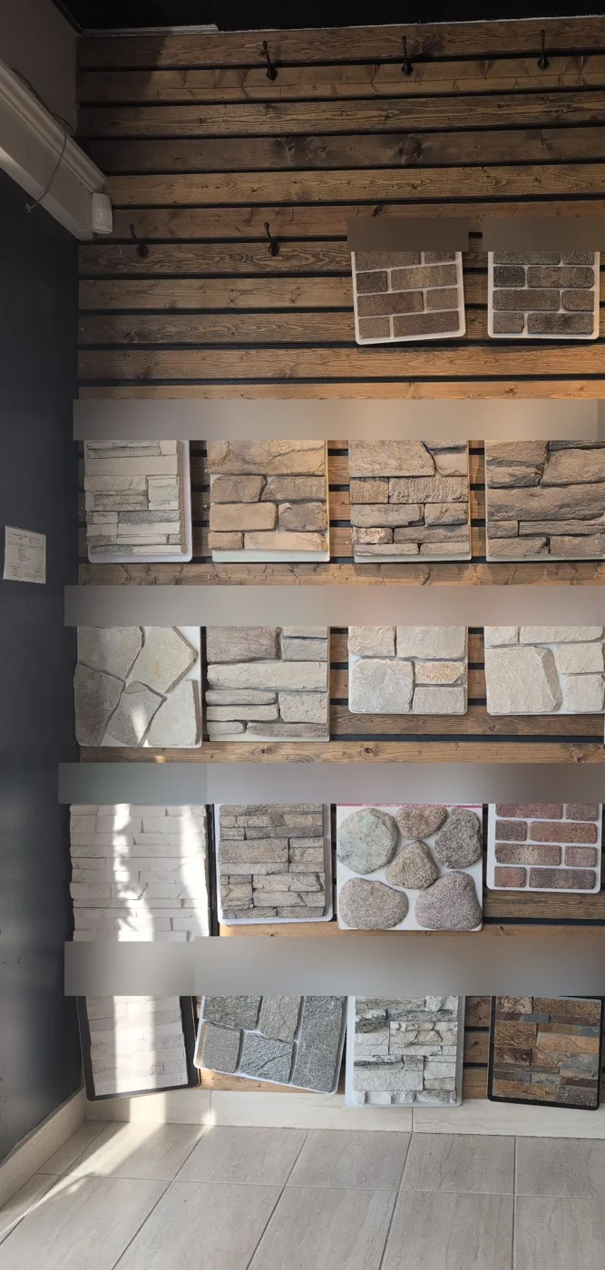 Stacked stone, ledgestone, fieldstone and thin brick veneer samples on a showroom wall in Winnipeg