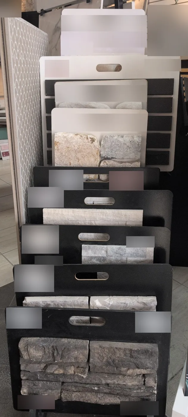 Stacked stone, river rock and limestone look veneer panels in a Winnipeg showroom